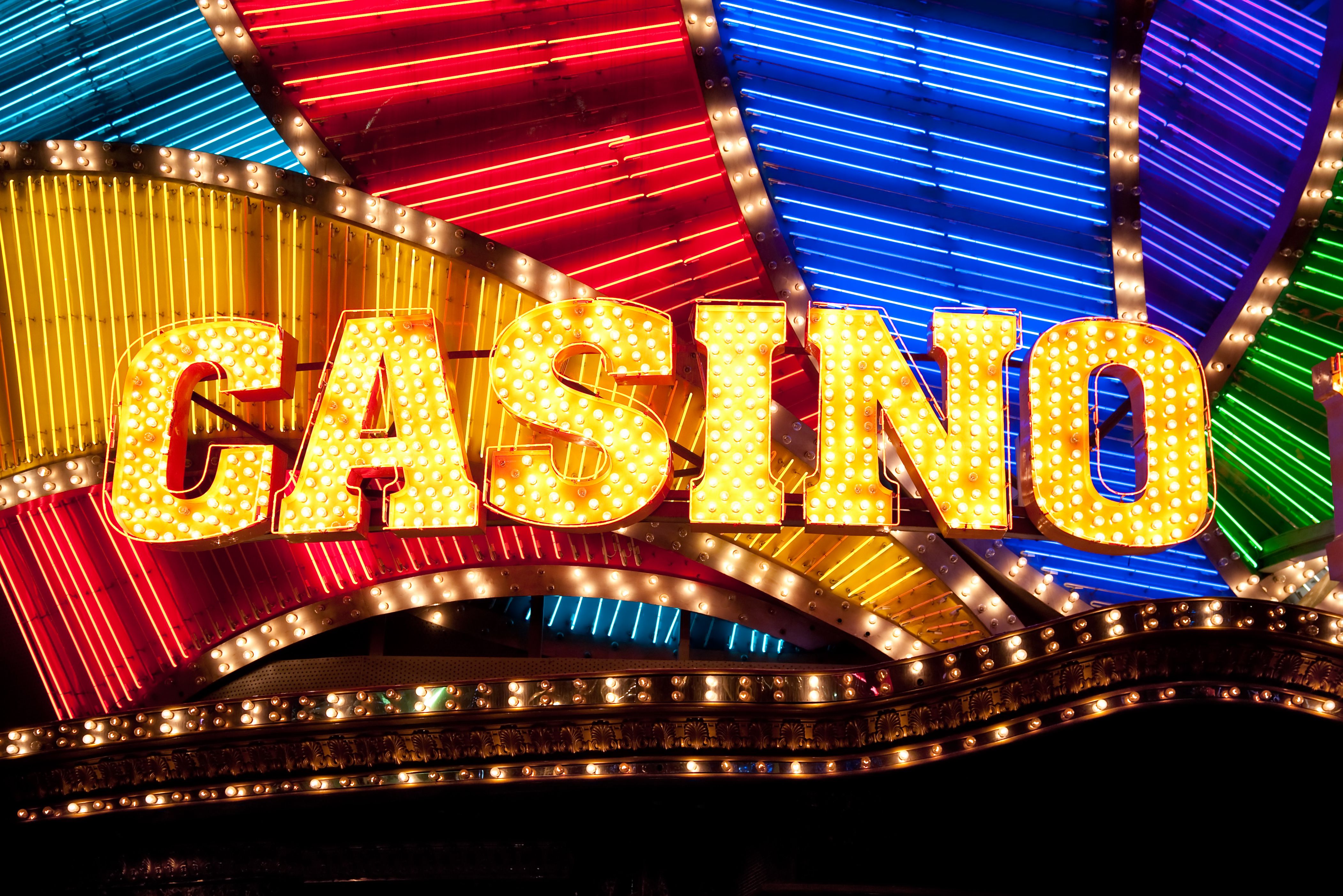 A vibrant graphic showcasing the Slots Era logo with fantasy characters and gold coins.